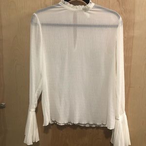 H&M white blouse with ruffle details